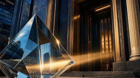 A faceted glass prism aligning reflections of a financial building in a beam of golden light